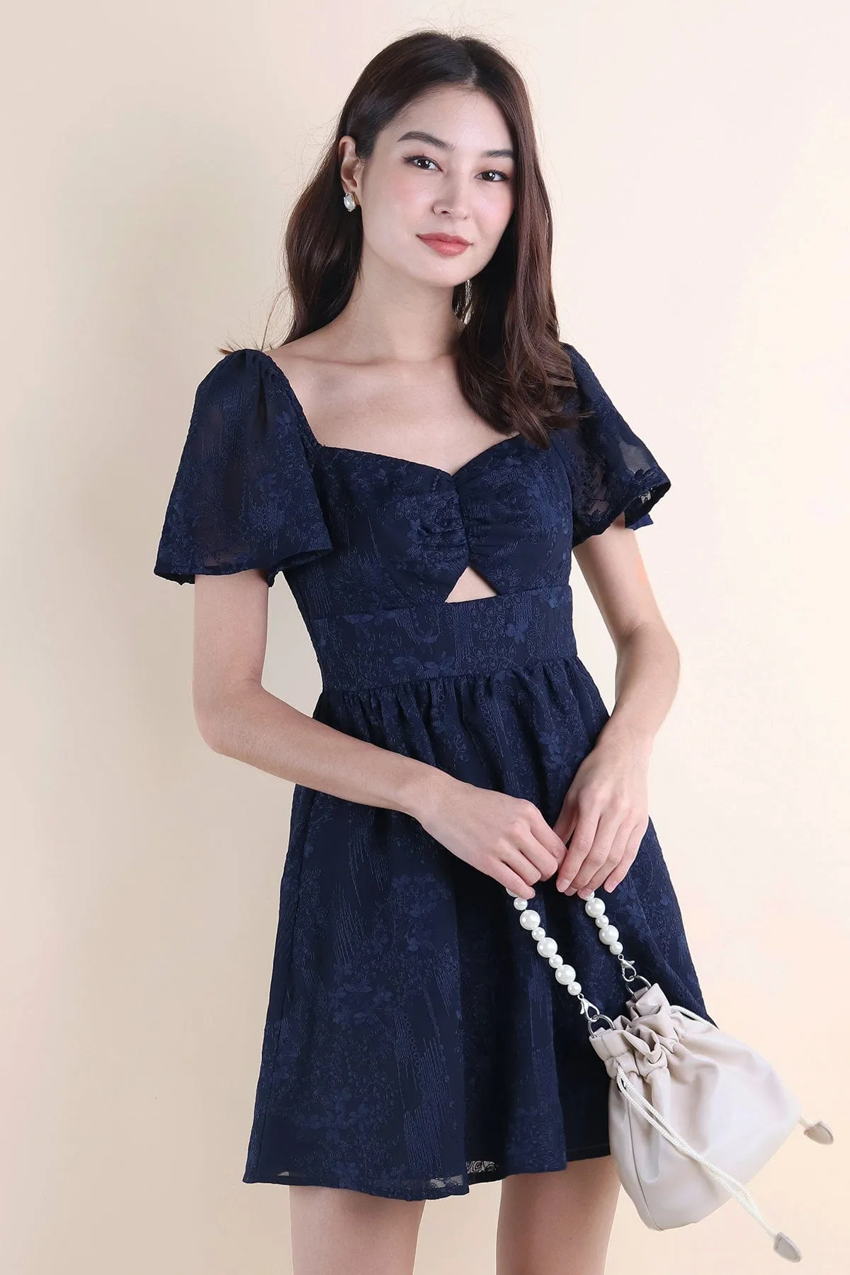 FIDELIA FLUTTERS CUT-OUT DRESS IN NAVY