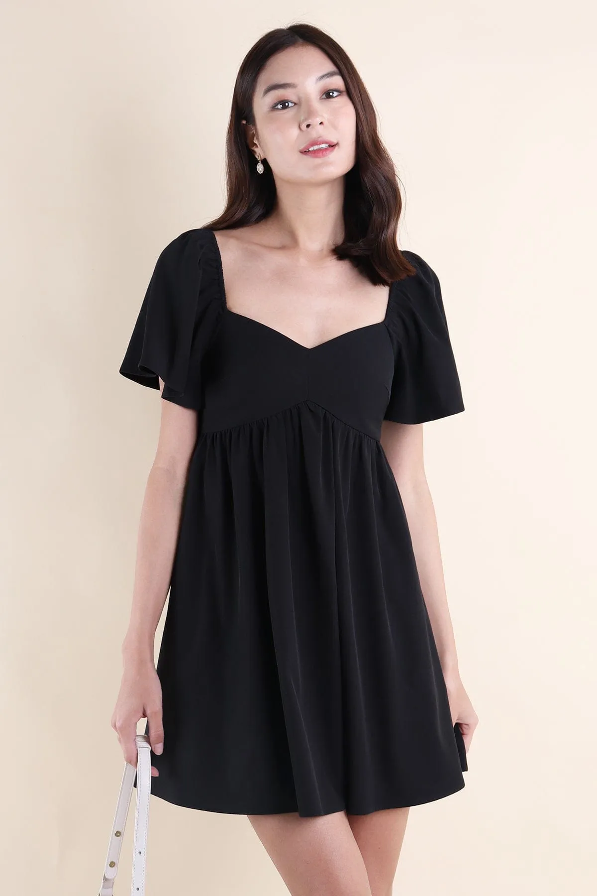 FIOERA FLUTTERS DRESS IN BLACK