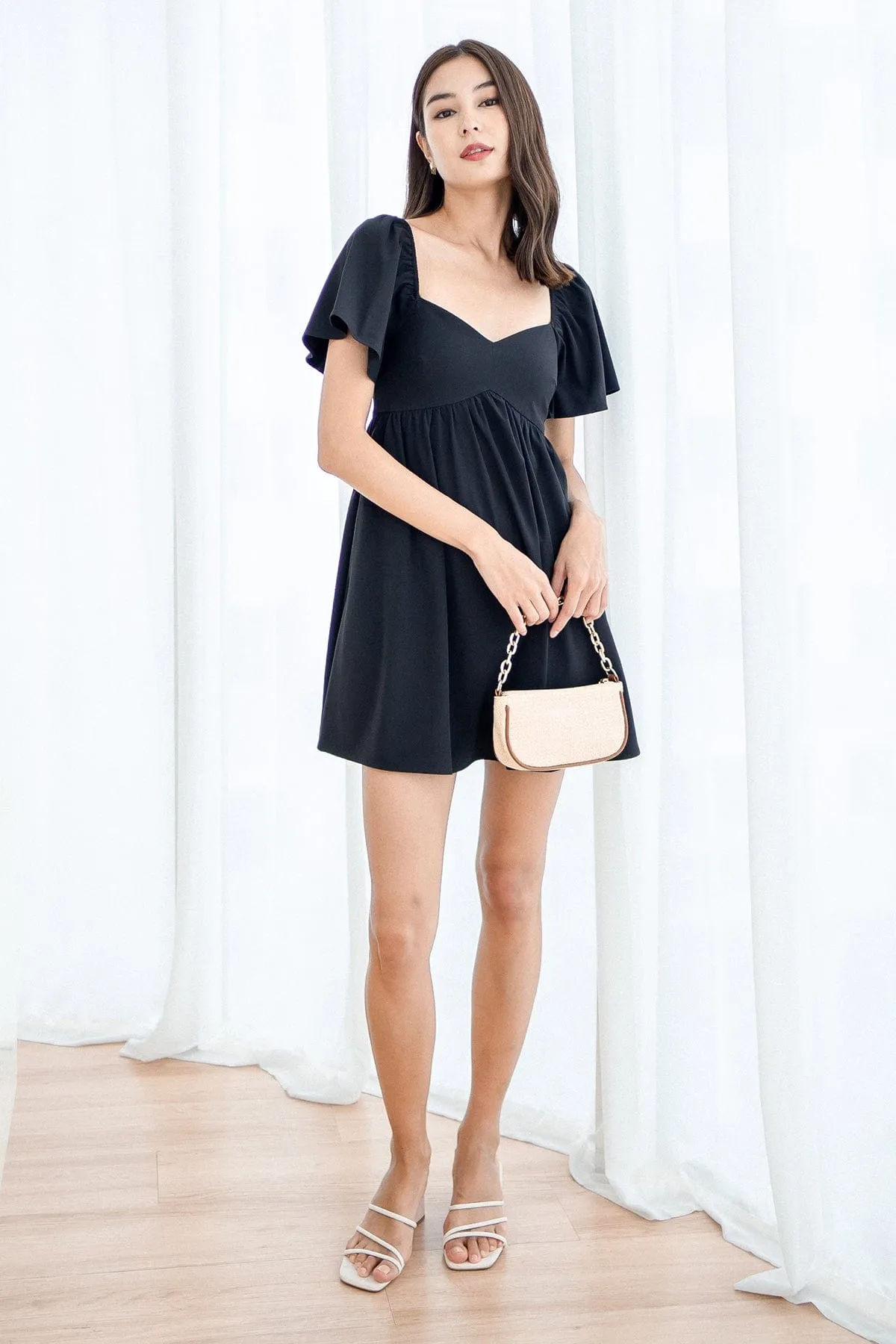 FIOERA FLUTTERS DRESS IN BLACK