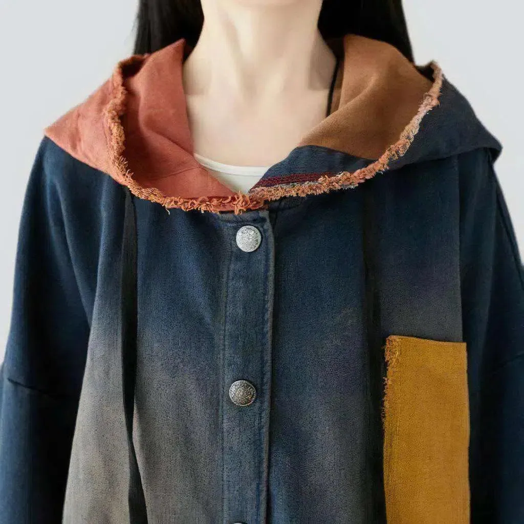 Long medium-wash denim coat