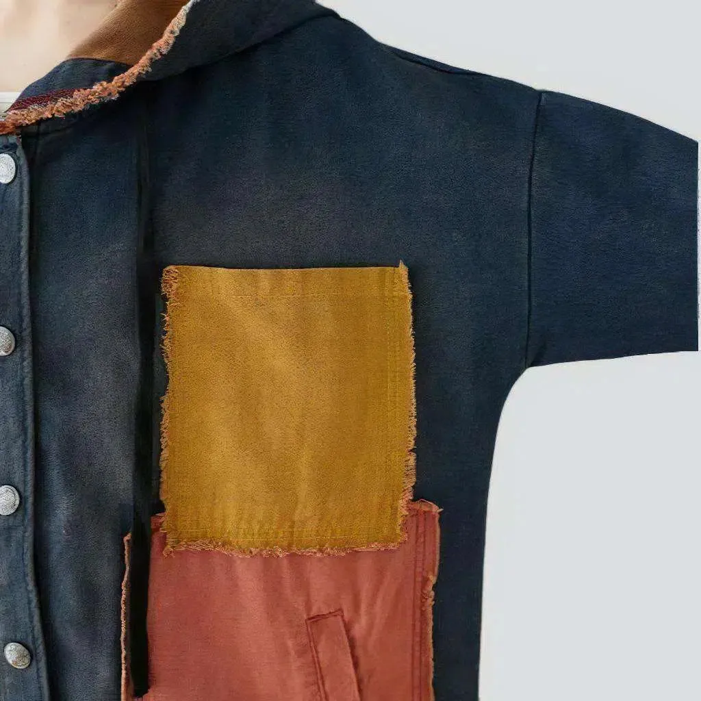 Long medium-wash denim coat